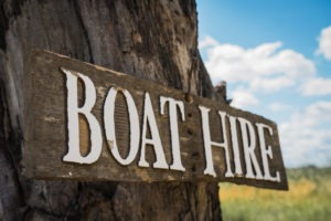 moremi boat hire sign