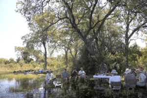 selinda spillway canoe safari lunch in water