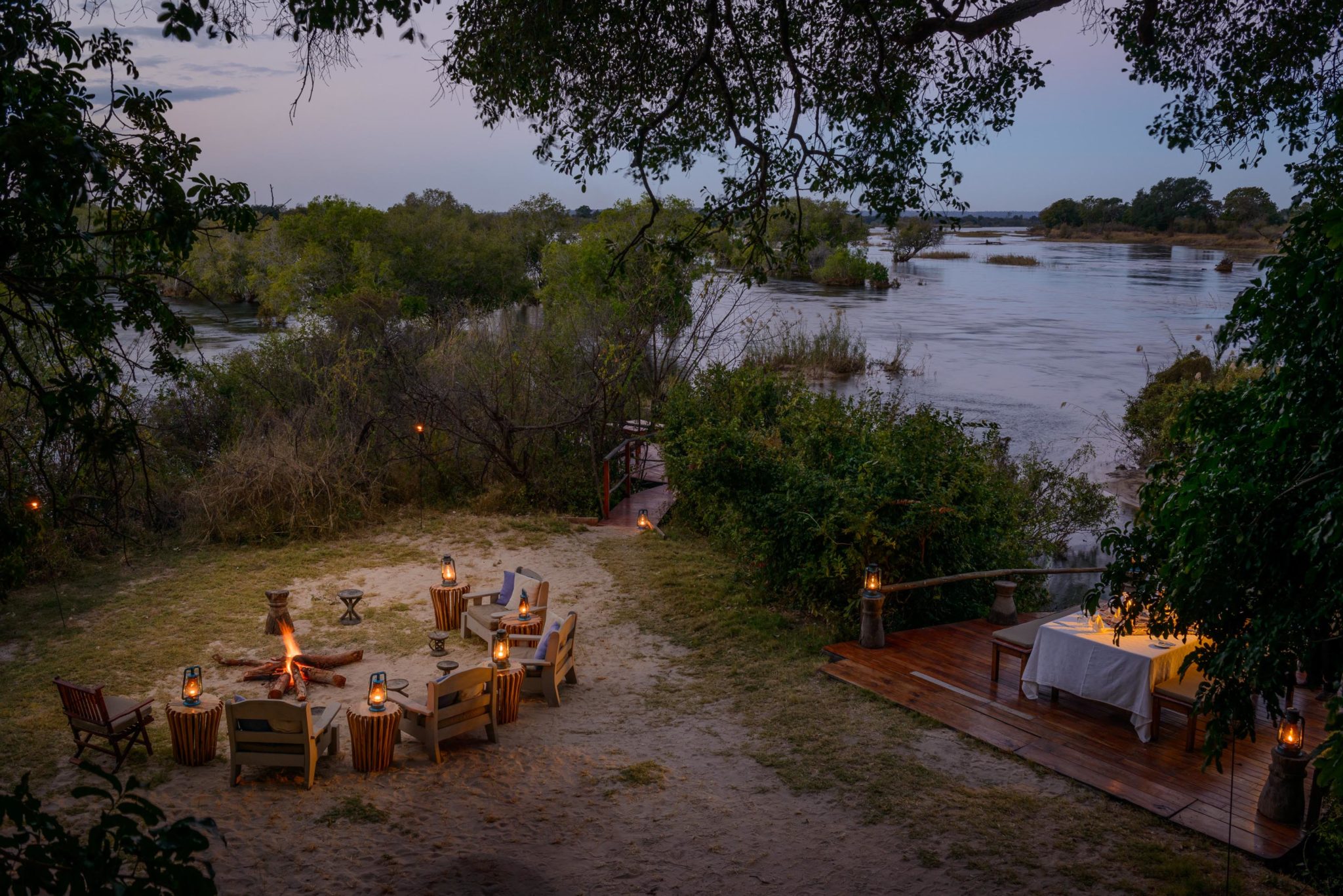 zambia livingstone sindabezi dinner setting on river
