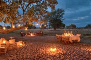 zambia luangwa valley candlelight dinner outside