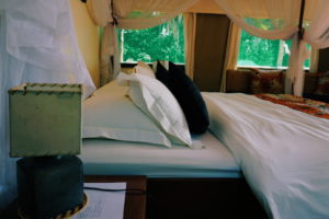 rwanda akagera ruzizi tented camp bed