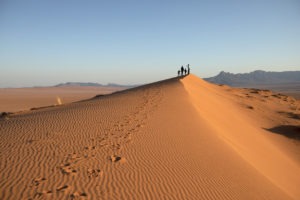 2Kwessi Dunes Walking up the dunes