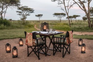 Legendary Serengeti Mobile Camp private dining with a view of the landscape